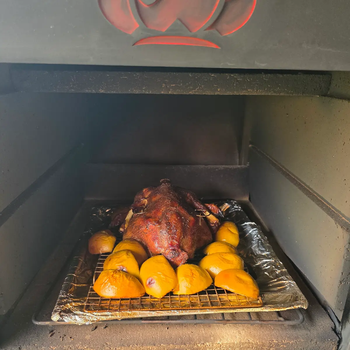 Grill zone in a wood-fired oven between 160 and 200 degrees Celsius, with even radiant heat