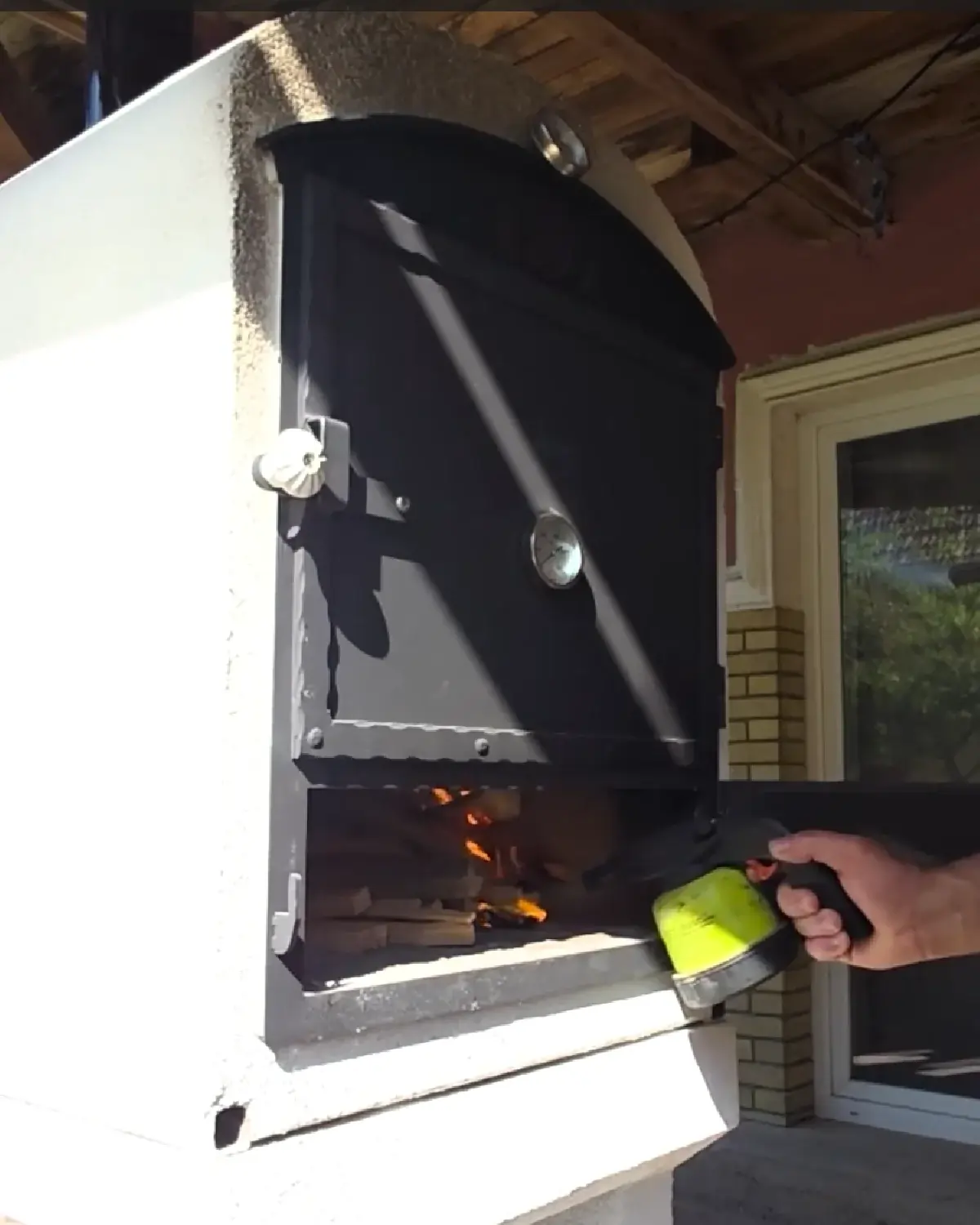 Pizza temperature in a mobile wood-fired oven can be reached in about 30 to 40 minutes with proper firing